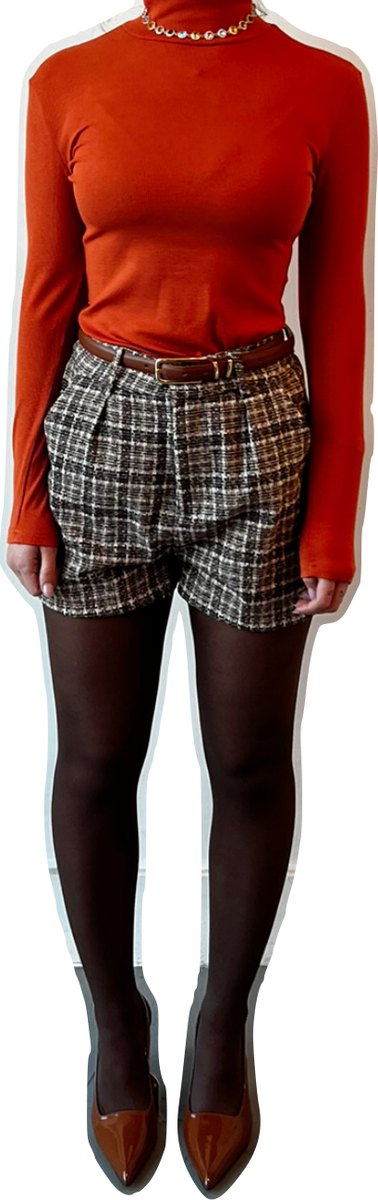 Fitting record: red roll-neck with checked shorts and sheer tights