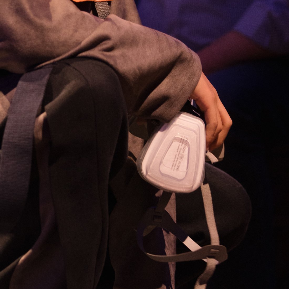 Set 01, the respirator carried in one hand