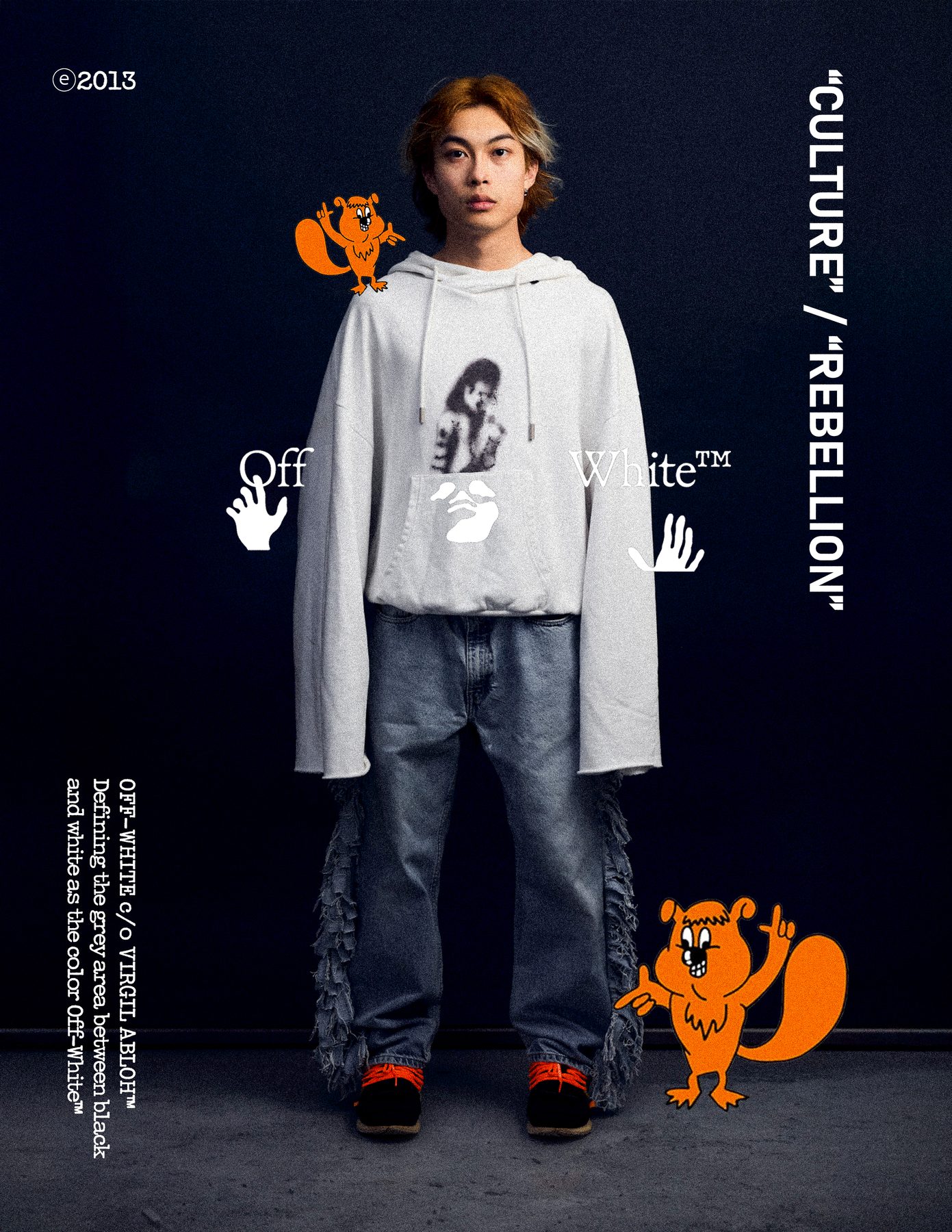 Model straight to camera in a cropped off-white hoodie with long sleeves