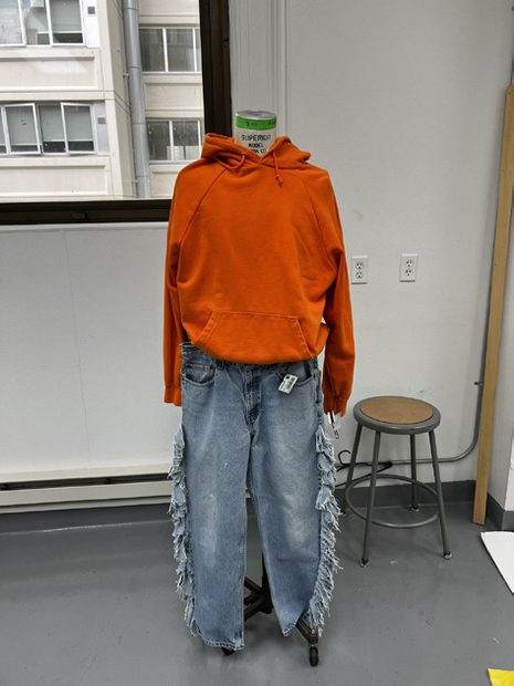 Look six styled on a dress form