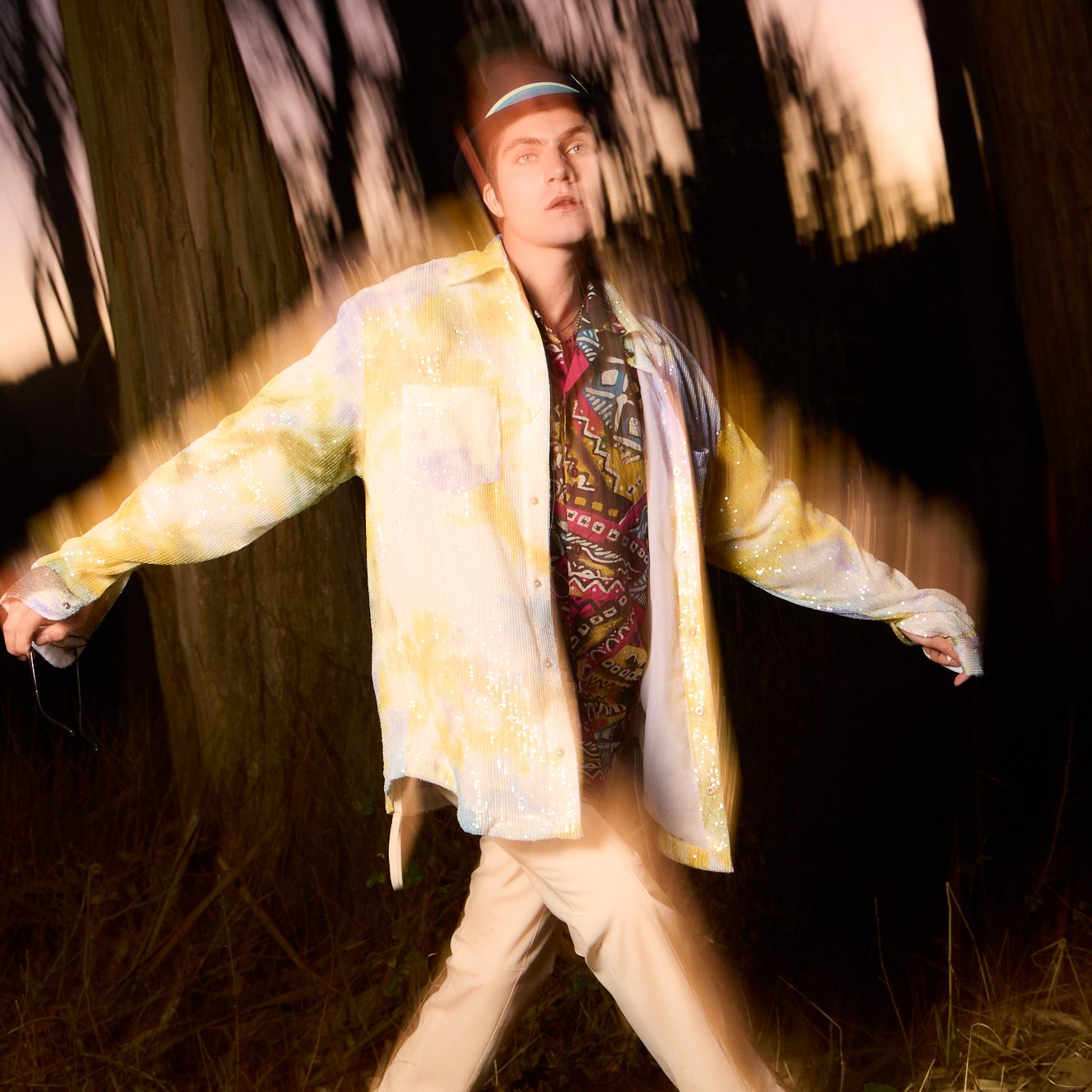 Square crop of the dragged frame, sequins catching the flash